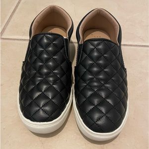 A New Day black quilted sneakers. Only worn once. Pet and smoke free home.